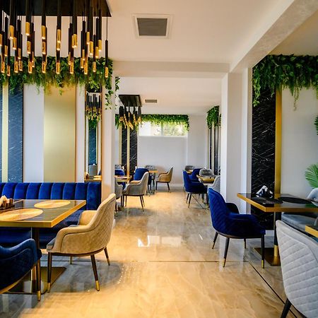 Elitte Inn & Suites Rosu Экстерьер фото